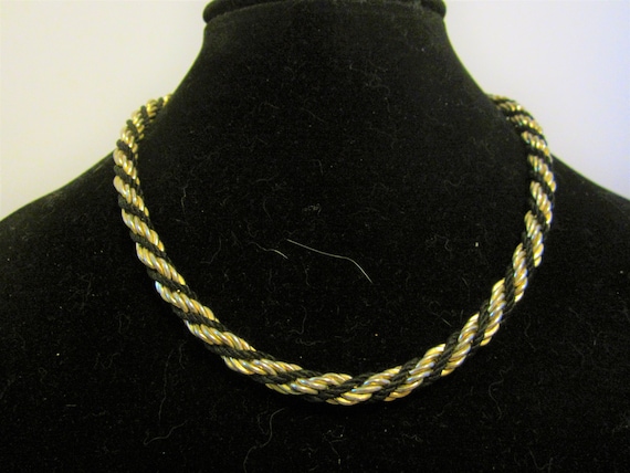 gold and* black toned swirled toned necklace - image 1