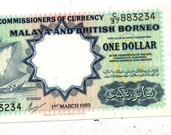 rare 1945 M 10b WW II issue Uncirculated  Banknote Malaya  $1000  ND 