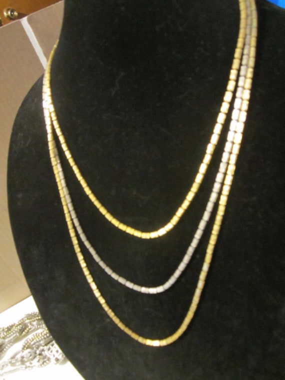 Multi strand gold and silver toned necklace - image 2