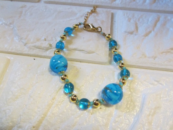 Gold Toned and blue beaded  bracelet - image 1