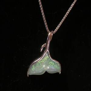 Fashion pendant necklace on silver toned chain