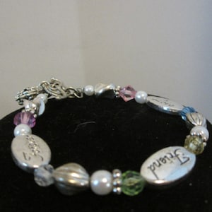 SIlver* toned charm bracelet