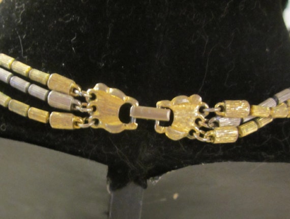 Multi strand gold and silver toned necklace - image 3