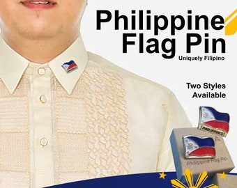 May include: A man wearing a light beige shirt with a small Philippine flag pin on the collar. The text "Philippine Flag Pin" is written in black letters on a white background. The text "Uniquely Filipino" is written in black letters on a white background. The text "Two Styles Available" is written in black letters on a white background. The image also shows two different styles of Philippine flag pins.
