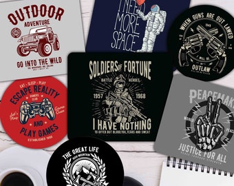 May include: A collection of graphic design coasters with various themes. Designs include a jeep, an astronaut, a pair of revolvers, a soldier, a peace sign, a video game controller, and mountain-themed graphics. Each coaster features unique text.