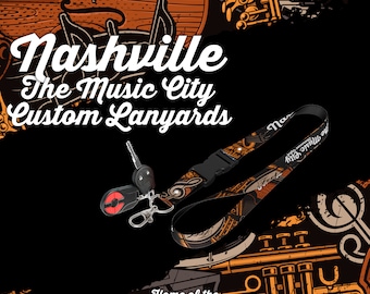 May include: A black and gold lanyard with a musical note design and the text "Nashville The Music City". The lanyard is attached to a key chain with a red and black key fob. The image also features a graphic of a trumpet and a guitar.