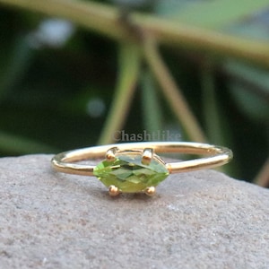 Green Peridot Ring: Marquise Cut Gemstone, 925 Silver, Gold Finish