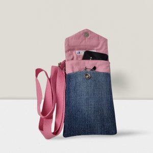 Cell phone pouch, removable shoulder strap. Handmade from recycled jeans. Printed cotton flap.