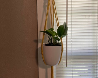 Yellow macrame plant hanger