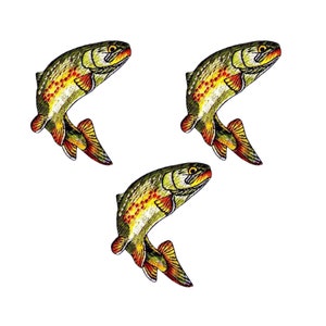 May include: Three embroidered iron-on patches of trout fish in a jumping pose. The fish are green, yellow, orange, and red.