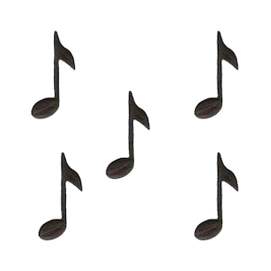 May include: Six black musical note iron-on patches. The notes are in the shape of a treble clef.