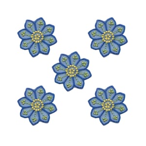 May include: Five blue embroidered flower appliques with yellow centers and green accents. The flowers are arranged in a circular pattern.