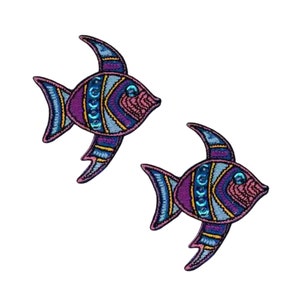 May include: Two colorful embroidered fish patches with purple, blue, and yellow stripes and sequins. The fish have a pink body and blue fins.