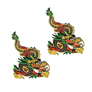 May include: Two gold, green, and red embroidered iron-on patches of a Chinese dragon.