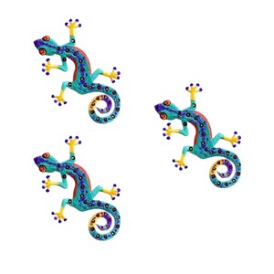 May include: Three embroidered gecko patches featuring a vibrant color palette of turquoise, yellow, and red. Each lizard has a textured surface with dark blue spots, orange eyes, and a curled tail, showcasing detailed stitching throughout the design.