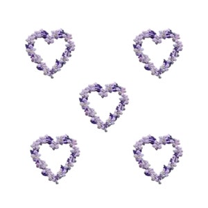 May include: Five purple flower heart wreaths on a white background.