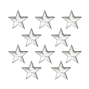 May include: A collection of ten identical five-pointed star patches arranged in a grid pattern. Each star features a metallic silver thread finish with a visible embroidered texture and a defined border, creating a uniform appearance across all pieces.