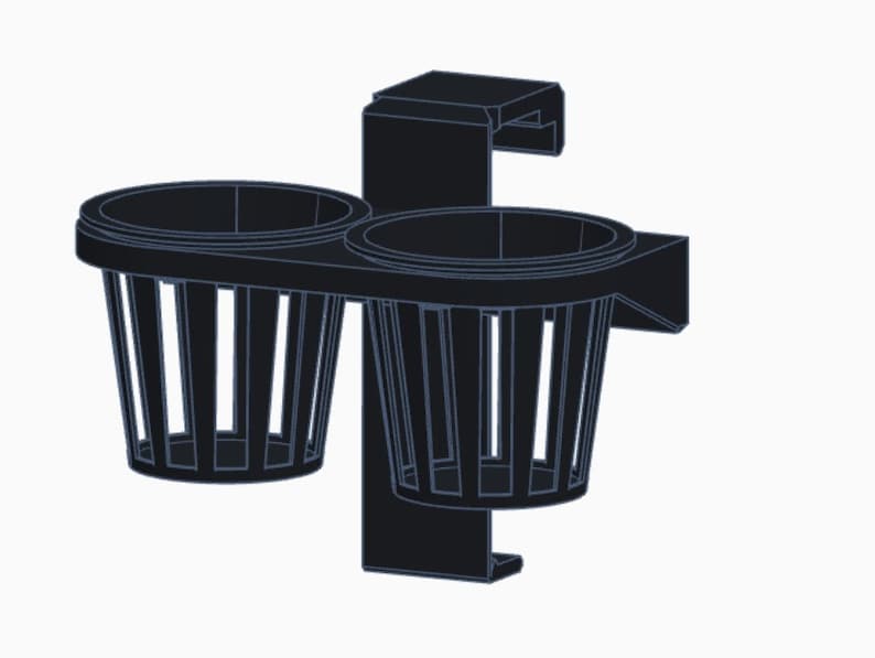 May include: A black metal cup holder with two cups. The cup holder has a clip on the back for attaching to a surface.