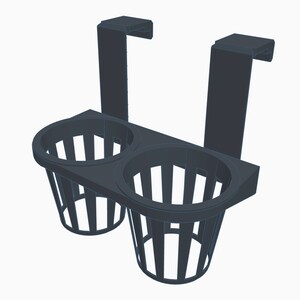 May include: A dark gray, over-the-door organizer with two round, slotted cup holders. The organizer has two hooks for hanging and is designed to hold items. The design is simple and functional.