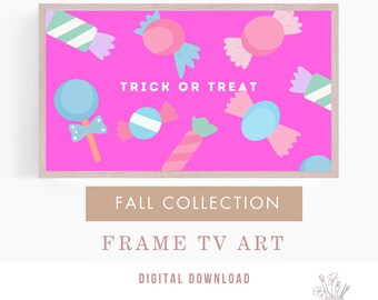 May include: A framed digital art print with a pink background and colorful candy illustrations. The text "Trick or Treat" is written in white on the print.