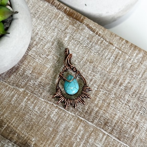 Southwestern copper wire wrapped pendant with Turquoise acrylic bead