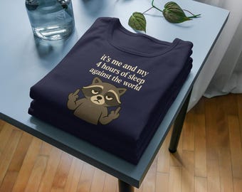 Funny Raccoon T-Shirt – “It’s Me & My 4 Hours Sleep Against the World” | Quirky Graphic Tee, Casual Women’s Shirt, Gift for Sleep Lovers