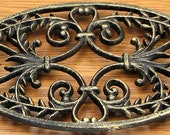 Oval Ornate Cast Iron Trivet