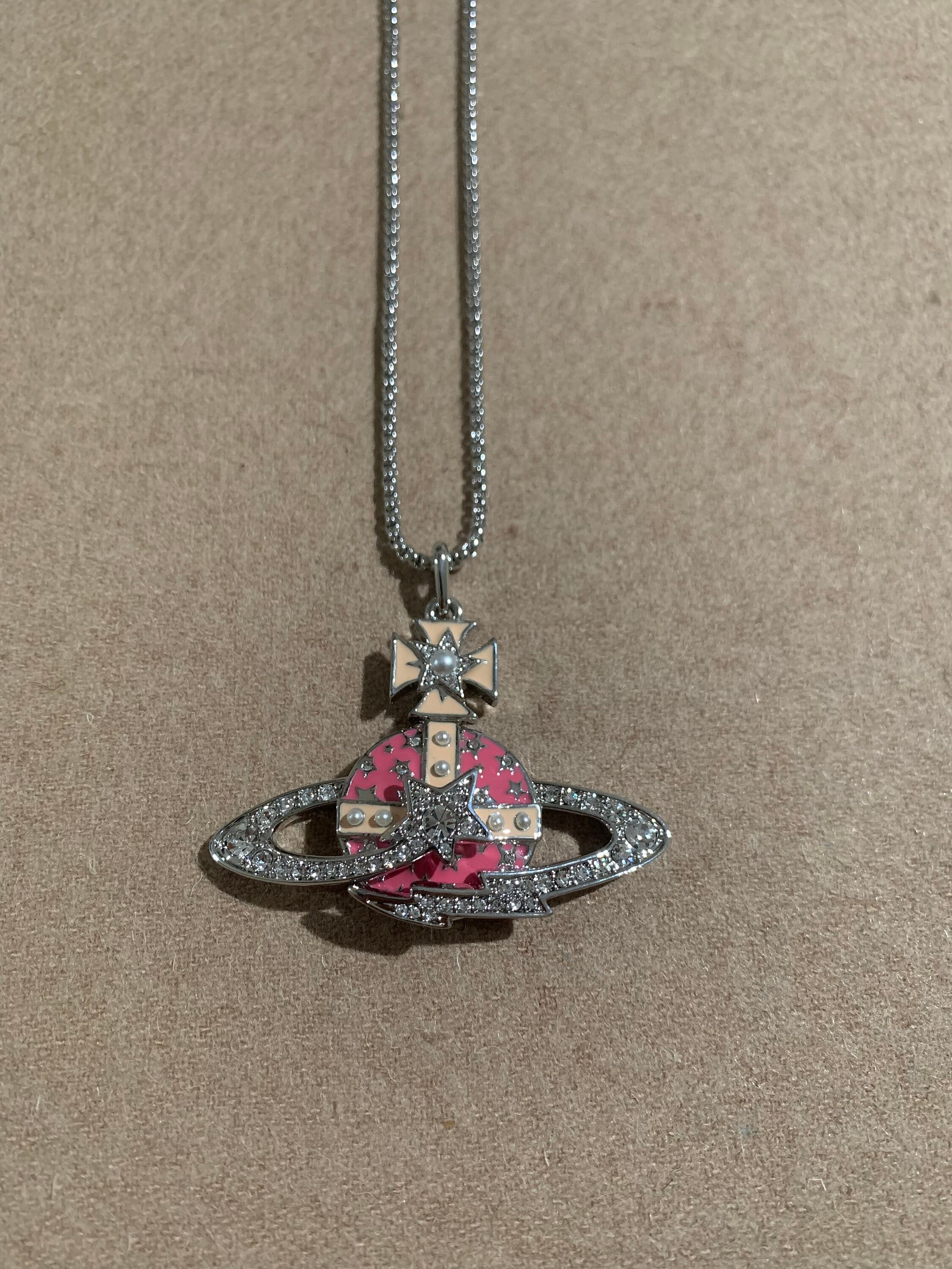 Vivienne westwood pink saturn on sale orb necklace