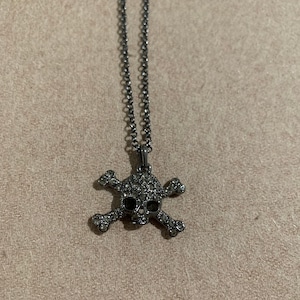 Vivienne westwood black skull necklace deals