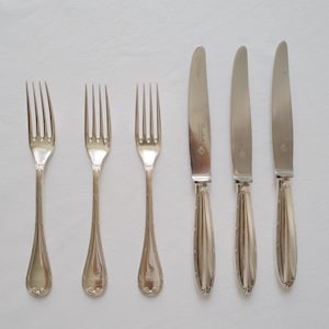 Vintage Christofle Inox flatware set for 3 persons. Knives and forks with bow ornament. Mother&#39;s Day gift @ Medowski Paris