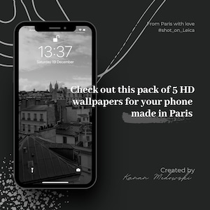 Op de afbeelding: Een zwart-witfoto van een Parijse stadsgezicht op het scherm van een smartphone. De telefoon geeft de tijd 13:37 en de datum zaterdag 19 december weer. De tekst "Check out this pack of 5 HD wallpapers for your phone made in Paris" wordt op het scherm weergegeven. De tekst "From Paris with love #shot_on_Leica" wordt boven de telefoon weergegeven. De tekst "Created by Kanan Medowski" wordt onder de telefoon weergegeven.