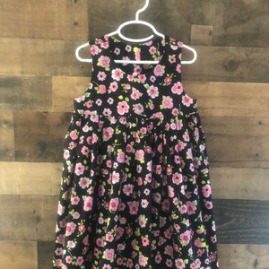 Pink Posies on Black little girl dress.