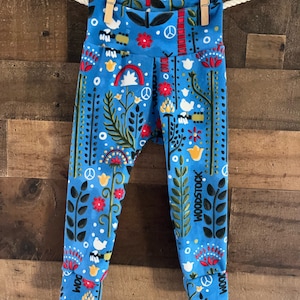 Woodstock Yoga style baby leggings with cuff.