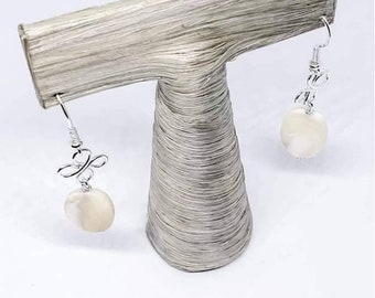 Silver dangling earrings with natural stone from Madagascar