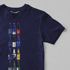 May include: A navy blue t-shirt with a vertical row of 10 different beer bottles printed on the front. The bottles are all different brands and styles.