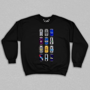 May include: Black sweatshirt featuring a graphic of twelve beverage cans with various team logos. The cans are arranged in a grid pattern. The top right corner of the sweatshirt has the text "/.OD".