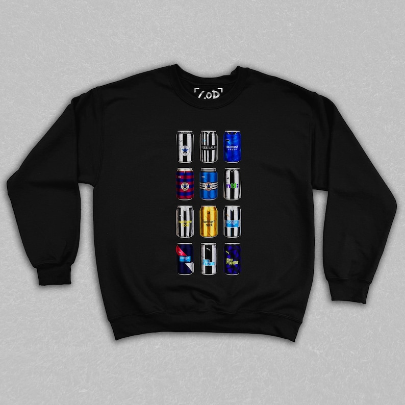 May include: Black sweatshirt featuring a graphic of twelve beverage cans with various team logos. The cans are arranged in a grid pattern. The top right corner of the sweatshirt has the text "/.OD".