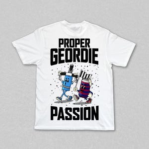 May include: White t-shirt featuring a cartoon illustration of a blue paintbrush and a red and blue can, both with legs and waving flags. The words "PROPER GEORDIE PASSION" are printed in black block letters.