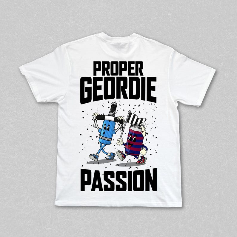 May include: White t-shirt featuring a cartoon illustration of a blue paintbrush and a red and blue can, both with legs and waving flags. The words "PROPER GEORDIE PASSION" are printed in black block letters.