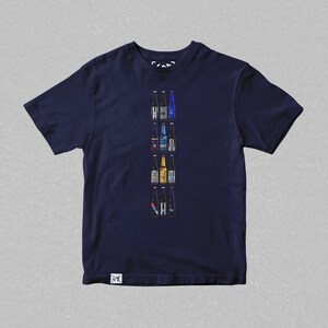 May include: A navy blue t-shirt with a graphic of a variety of beer bottles printed on the front. The bottles are arranged vertically in a row.