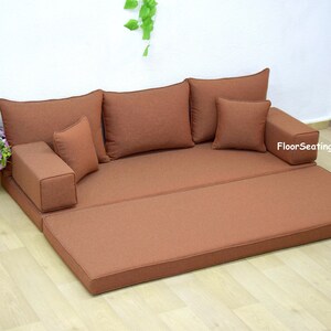 Couch that sits on ground new arrivals