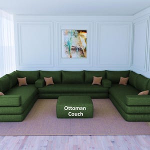 May include: A large, green sectional sofa with a matching ottoman. The sofa has multiple cushions and is arranged in a U-shape. The ottoman is labeled "Ottoman Couch".
