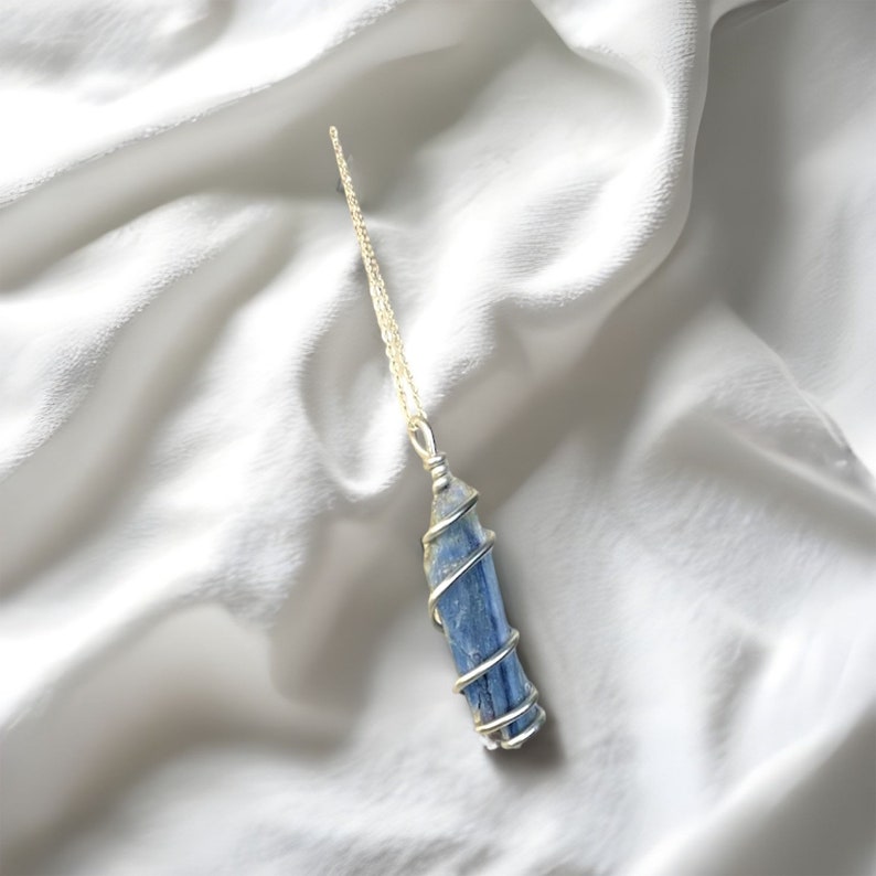 Raw Blue kyanite crystal wire wrapped with either silver, gold , black, rose gold, or bronze wire. thick wire uniquely wrapped around the raw kyanite crystal, boho hippie healing crystal necklaces, fast shipping handmade crystal jewelry