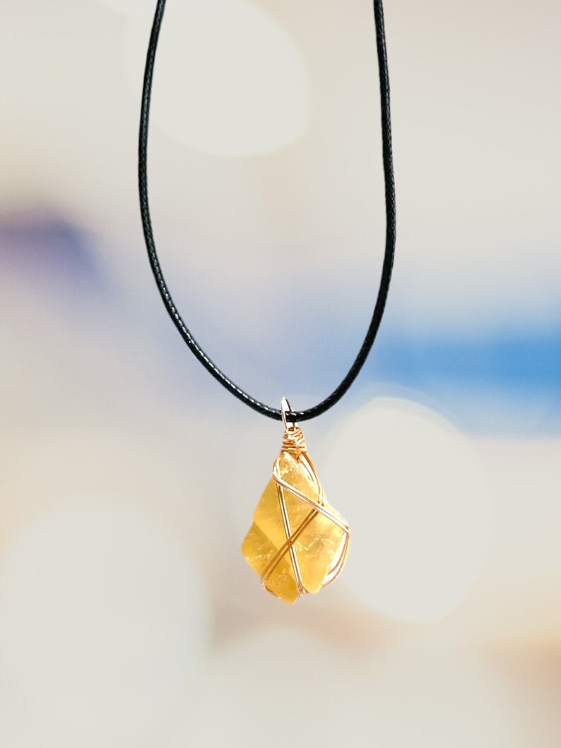 small and minimalist raw honey calcite wire wrapped unique crystal necklace