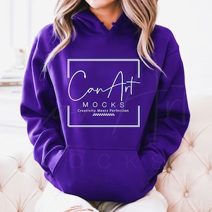 May include: A purple hoodie with a white square on the front that says "CanArt" and "Creativity Meets Perfection".