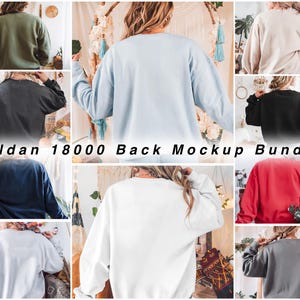 以下が含まれることがあります： 黒、白、赤、青、グレー、ライトブルーなど、さまざまな色の10枚のギルダン18000スウェットシャツのバックビュー。スウェットシャツはすべて、ボヘミアンな背景のある木製の表面に置かれています。