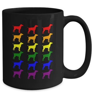 May include: Black coffee mug with a rainbow design of dog silhouettes. The dogs are arranged in rows, with each row a different color of the rainbow.