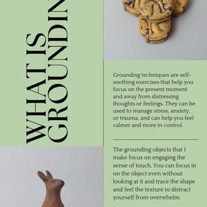 May include: A light green informational flyer titled WHAT IS GROUNDING? featuring text about grounding techniques, a small brown clay rabbit figurine, and three textured, circular, tan-colored clay objects with dark etched lines.