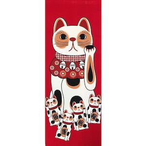 May include: A red fabric wall hanging with a white and black Maneki-Neko, or lucky cat, with a raised paw. The cat is wearing a red collar with gold bells and a red and white floral pattern. Four smaller Maneki-Neko cats are at the bottom of the hanging, each with a raised paw and the word "福" (meaning "good fortune") on their bellies.