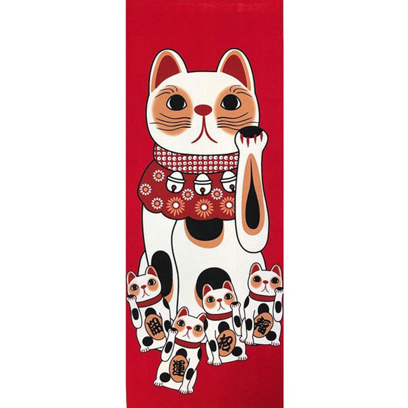 May include: A red fabric wall hanging with a white and black Maneki-Neko, or lucky cat, with a raised paw. The cat is wearing a red collar with gold bells and a red and white floral pattern. Four smaller Maneki-Neko cats are at the bottom of the hanging, each with a raised paw and the word "福" (meaning "good fortune") on their bellies.